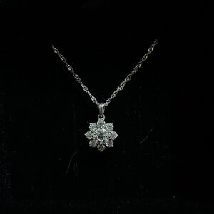 made with 925 sterling silver, 1.30CT of round VVS1 clarity moissanite stones.